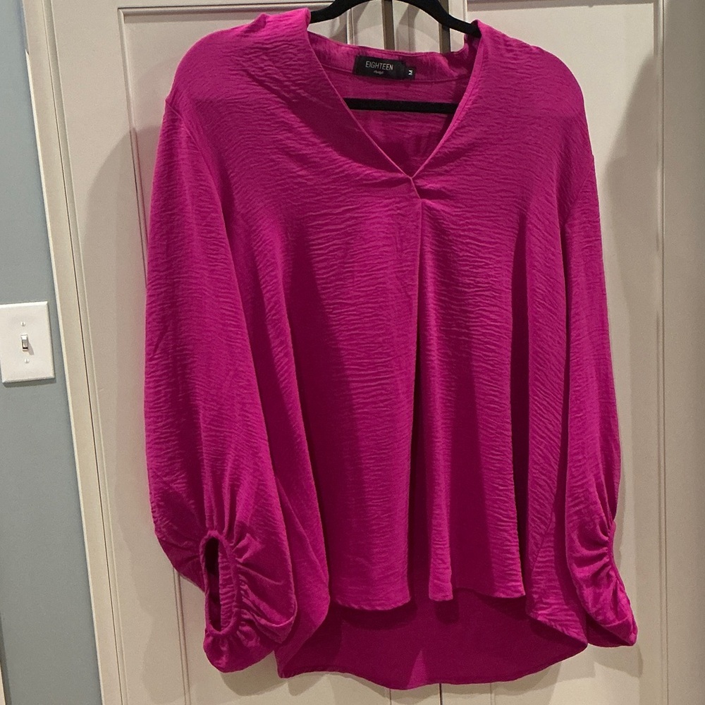 Ladies Eighteen gushiest blouse size medium.
